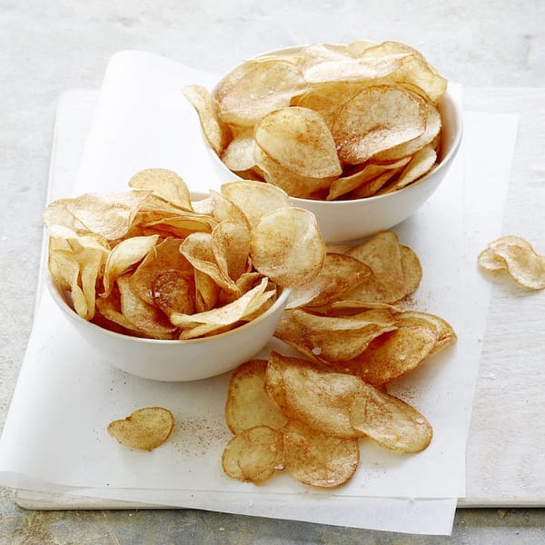 Homemade potato chips on paper